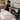 Organized and clutter-free storage solutions for spa and salon backup supplies featuring shelving, bins, and furniture from Pure Spa Direct.