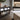 Image showcasing organized storage solutions for massage bolsters, featuring options like vacuum bags, wall hammocks, and cubbies to prevent rolling and clutter.
