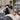Professional facial steamer in a spa treatment room with adjustable arm and focused steam nozzle