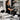 A clean, organized salon retail display featuring skincare and beauty products, free from nail dust.