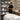Serene and professional open shelving display in a spa setting, featuring organized salon products.