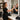 A clean, sparkling professional salon mirror reflecting a modern salon interior, highlighting the importance of mirror maintenance for beauty professionals.