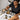 A professional showing how to clean and maintain the heating element in a salon wax warmer