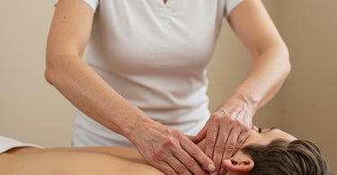 Spa professional performing lymphatic drainage treatment