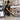 Professional salon furniture arranged for easy cleaning to prevent hair and dust buildup underneath