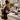 Beauty professional using an ergonomic workstation setup to help prevent neck strain during a detailed salon or spa service