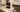 Banner image for the Pure Spa Direct blog post titled How to Prevent Retail Overflow From Taking Over the Reception Area, featuring a serene and organized salon or spa reception area.