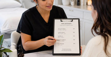 A clear and simple menu board illustrating how to price mini upgrades like Dermaplane Boost, Hydration Boost, and LED Therapy Boost without confusing spa and salon clients.