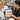 Professional Wood's Lamp skin analysis on a client in a dark spa treatment room