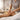 Graphic illustrating calm breathing techniques with 'Inhale' and 'Exhale' instructions for reducing waxing pain, featuring a serene background.