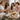 A smiling group of bridesmaids in robes relaxing together in a luxurious spa setting before a wedding