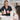 Close up of a professional massage therapist safely performing a scalp massage on a client with blonde hair extensions using gentle lifting technique to avoid tangling