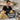 A spa professional holding a natural loofah scrub, with essential oils and cleaning supplies arranged on a wooden spa tray, highlighting proper loofah sanitization for a hygienic spa experience