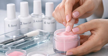 Sanitizing dip powder system with cleaning supplies, brushes, and liquids on a nail salon counter