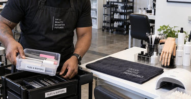 Organized storage of salon training equipment including manikin heads and portable tables between classes