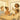 Spa professional gently consulting with client about service options in a relaxing treatment room