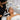 High-frequency spot treatment protocols to treat maskne, featuring a professional esthetician using a high-frequency machine on a client to fight acne-causing bacteria.