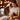 Professional facial steamer emitting gentle warm mist during a spa treatment