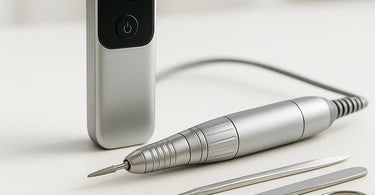 Professional electric nail drill being used for perfect manicure in salon setting