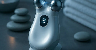 Professional microcurrent device in use during a facial treatment, showing glowing skin