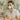 Professional nail technician wearing dust mask while performing acrylic nail service