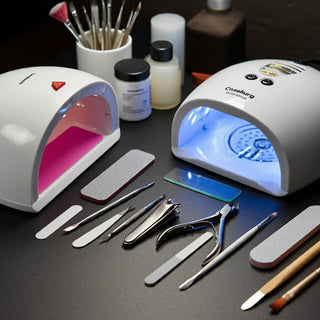 Professional manicure tools neatly arranged on a salon table