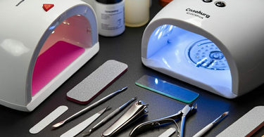 Professional manicure tools neatly arranged on a salon table