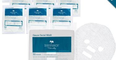 Intrinsics Precut Cotton Gauze Essential Facial Masks 500-count case open showing multiple bags of professional spa masks