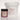 Keyano Champagne and Rose Scrub 80 oz tub with pink label and silver lid on a white surface