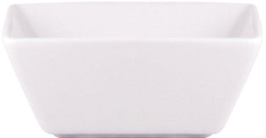 Kyoto Square Dish Porcelain White on a spa counter with essential oils and a towel.