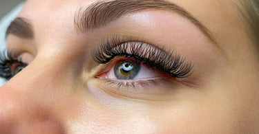 A close-up of a beautifully curled eyelash lift.