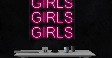 Girls Girls Girls LED Flex Neon Sign in hot pink illuminating a modern spa lounge area