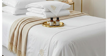 Luxurious spa bedding setup showcasing premium linens and client comfort