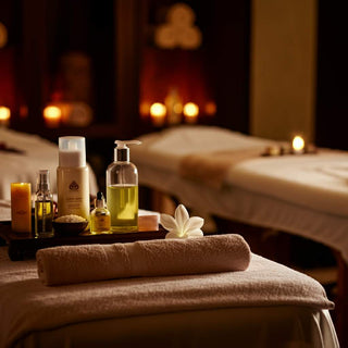 Luxury spa package with a serene ambiance including candles and plush towels.