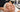 Esthetician applying finishing facial products with a gentle patting motion to prevent product pilling on client's skin