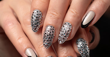 Manicure with Rhinestones, showing a close-up of nails decorated with various rhinestone patterns.