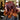 Professional stylist applying dimensional hair color technique