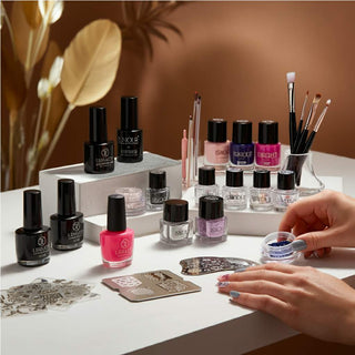 Assorted high-quality nail art supplies including polishes, brushes, and embellishments.