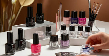 Assorted high-quality nail art supplies including polishes, brushes, and embellishments.