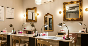 Nail salon with multiple nail tables