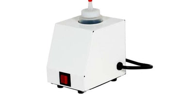 Neo-Spa Bottle Warmer in Snow White by Whitehall Manufacturing on a spa counter