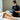 Numbing cream being applied before a waxing treatment