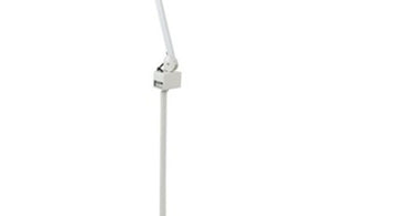 Paragon 5-Diopter Magnification Lamp Only - No Stand, clamped onto a salon table, showcasing its bright light and clear lens for professional waxing, lash, and brow services.