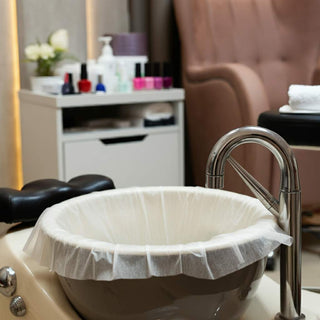 Disposable pedicure bowl liners ensuring hygiene and cleanliness in spa treatments