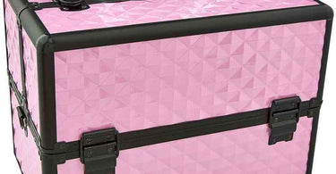 Pink Medium Cosmetic Train Case open on a salon counter displaying organized nail tools, cosmetics, and beauty supplies for professional use.