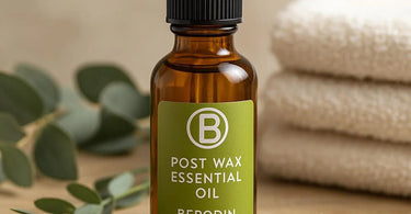 Berodin Post Wax Essential Oil Pro Calming Treatment bottle surrounded by spa essentials