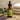 Berodin Post Wax Essential Oil Pro Calming Treatment bottle surrounded by spa essentials