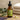 Berodin Post Wax Essential Oil Pro Calming Treatment bottle surrounded by spa essentials