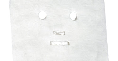 Package of Voesh Pre-Cut Gauze Facial Masks for professional spa use