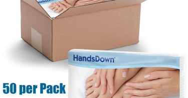 Stack of white Professional Nail Towels by HandsDown in packaging, showing 50 towels per pack and 10 packs per case for a total of 500 towels.